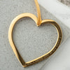 Dad, I carry you in my heart engraving on gold heart wit gold ribbon