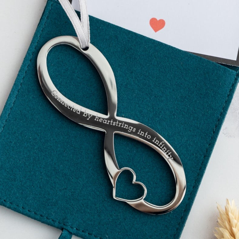 silver infinity decoration with silver ribbon